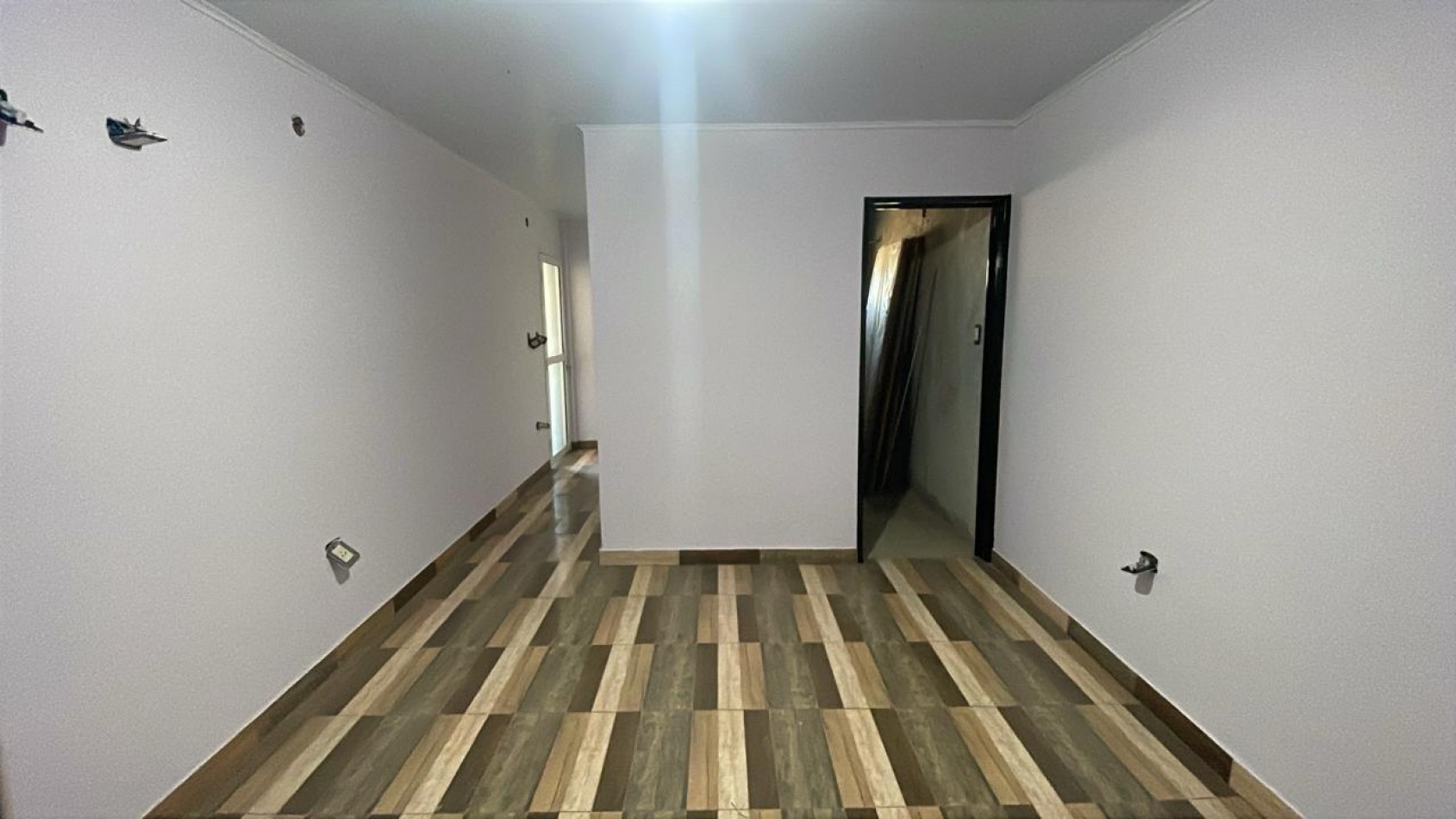 AMPLIA PROPIEDAD CON LOCALES Y VIVIENDA EN ITUZAINGO NORTE 