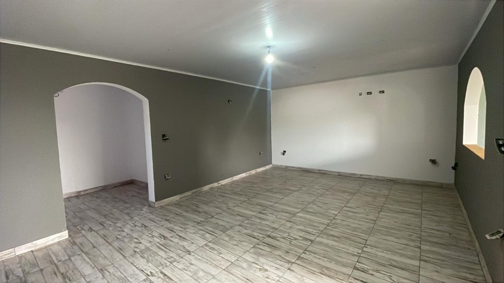 AMPLIA PROPIEDAD CON LOCALES Y VIVIENDA EN ITUZAINGO NORTE 