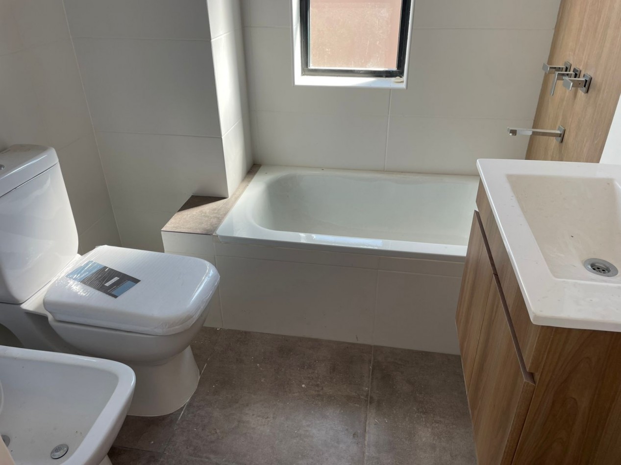DEPARTAMENTO 3 AMBIENTES CON COCHERA A ESTRENAR ITUZAINGO CENTRO